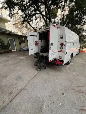 Magnet Plumbing service vehicle on-site for Water Heater Repair in Westlake